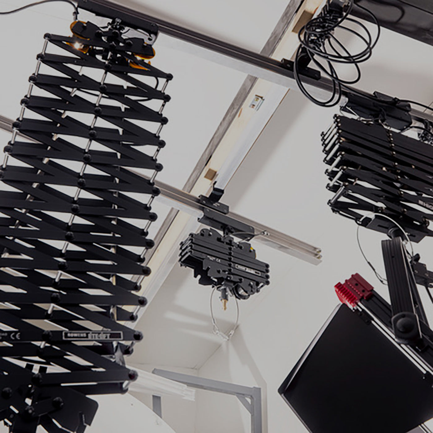 HiGlide Ceiling Track System in situ. Showing the Pantographs and lights attached.