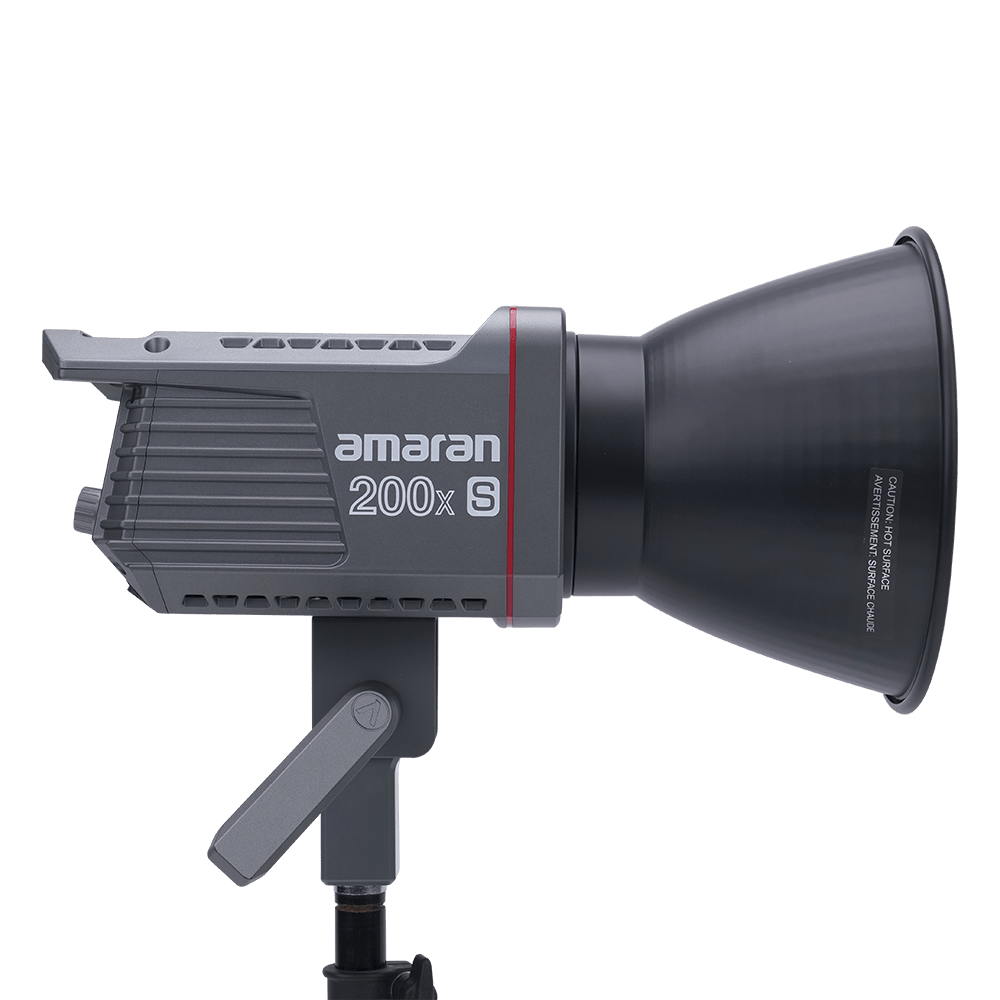 Side View of Amaran 200x S with a Bowens mount hyper reflector attached on a transparent background.