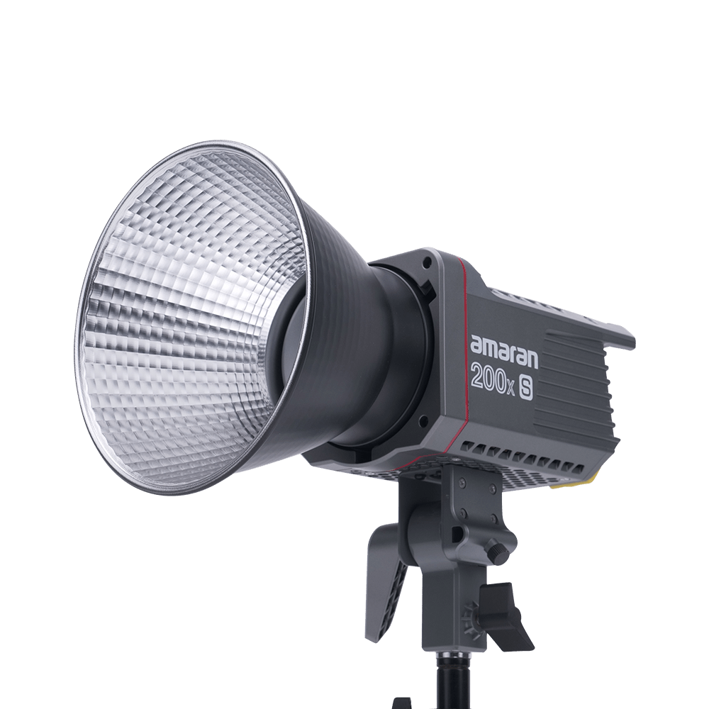 Side View of Amaran 200x S with a Bowens mount hyper reflector attached on a transparent background.