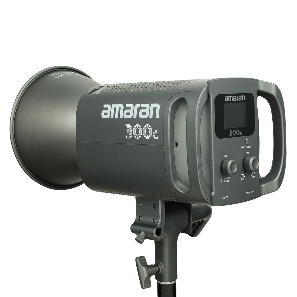 Amaran 300c LED CoB Light with Bowens mount hyper reflector attached on a transparent background.