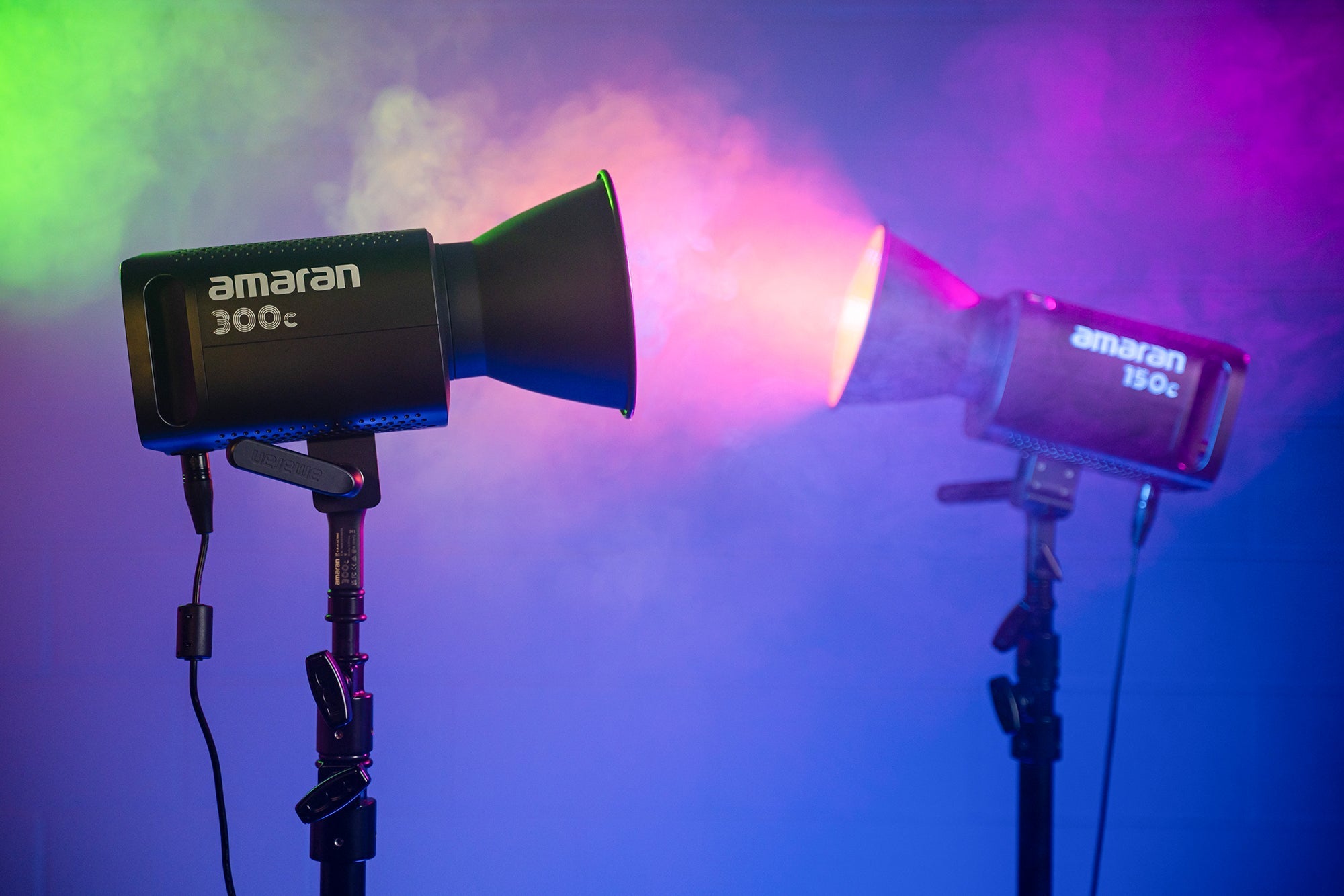 An Amaran 150c and 300c with Bowens Mount Hyper Reflectors attached with vibrant atmospheric colours.