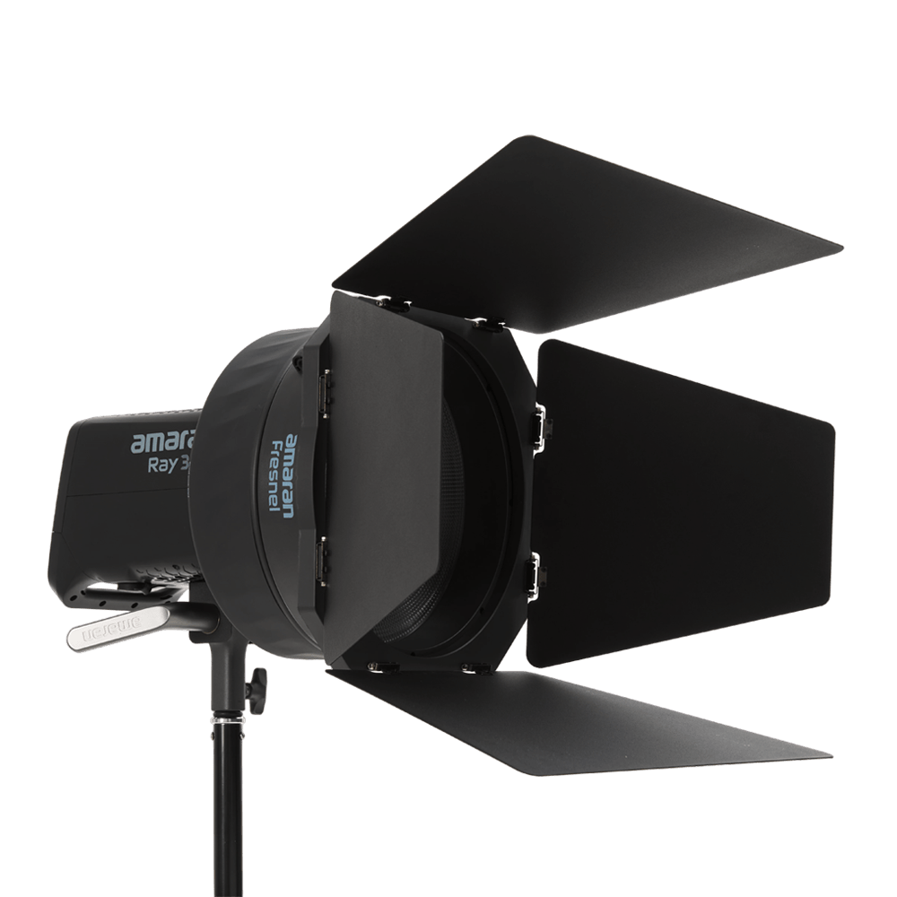 amaran fresnel and barndoors connected to a ray 360c LED light.