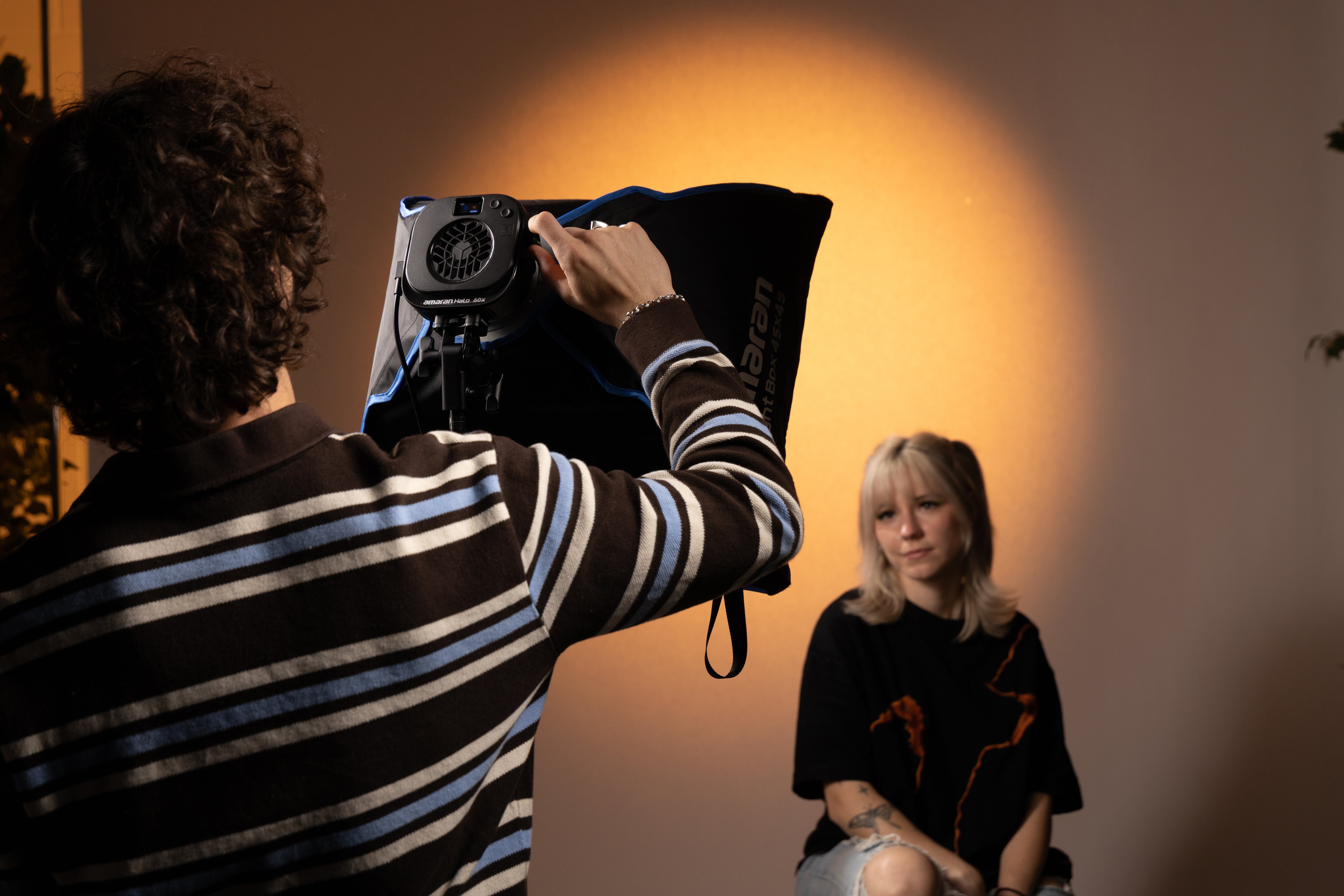 amaran Halo 60x being used in a studio with a light box attached.