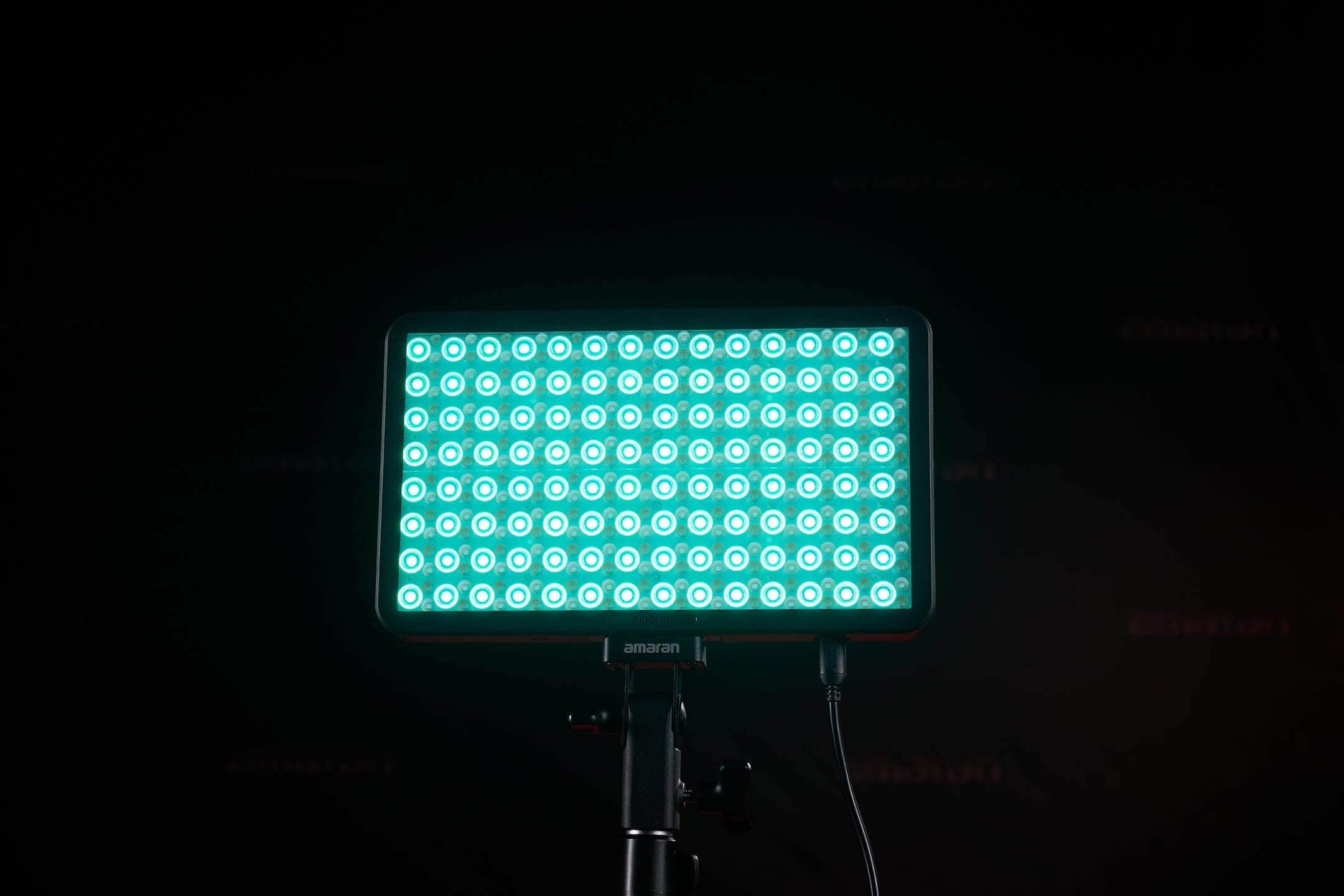 Front view of an amaran Pano 60c illuminating blue and white light.