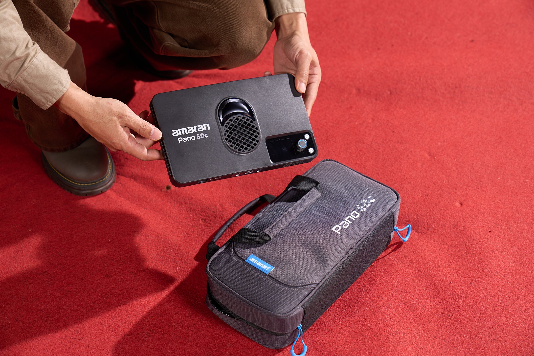 Rear view of an amaran Pano 60c with its accompanying case.