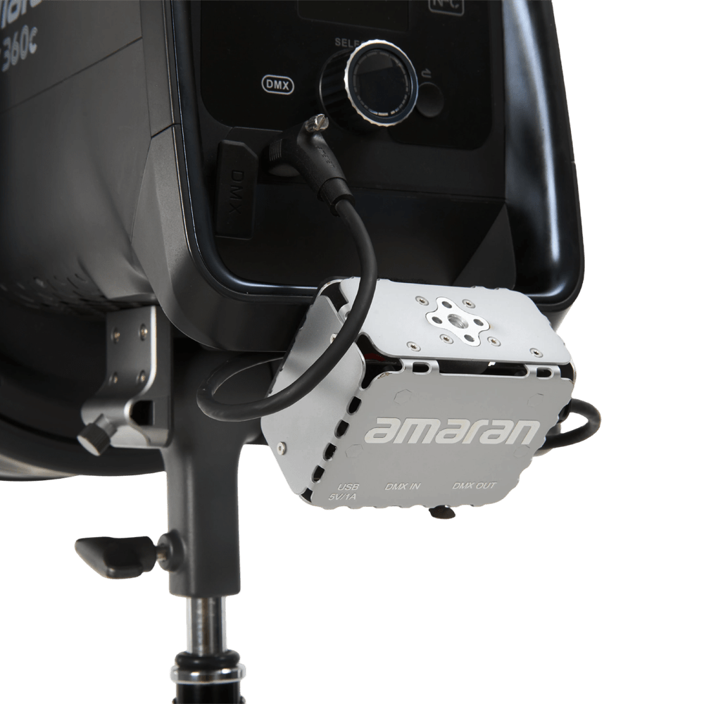 amaran USB-C to 5-Pin DMX In & Out Adapter attached to a light.