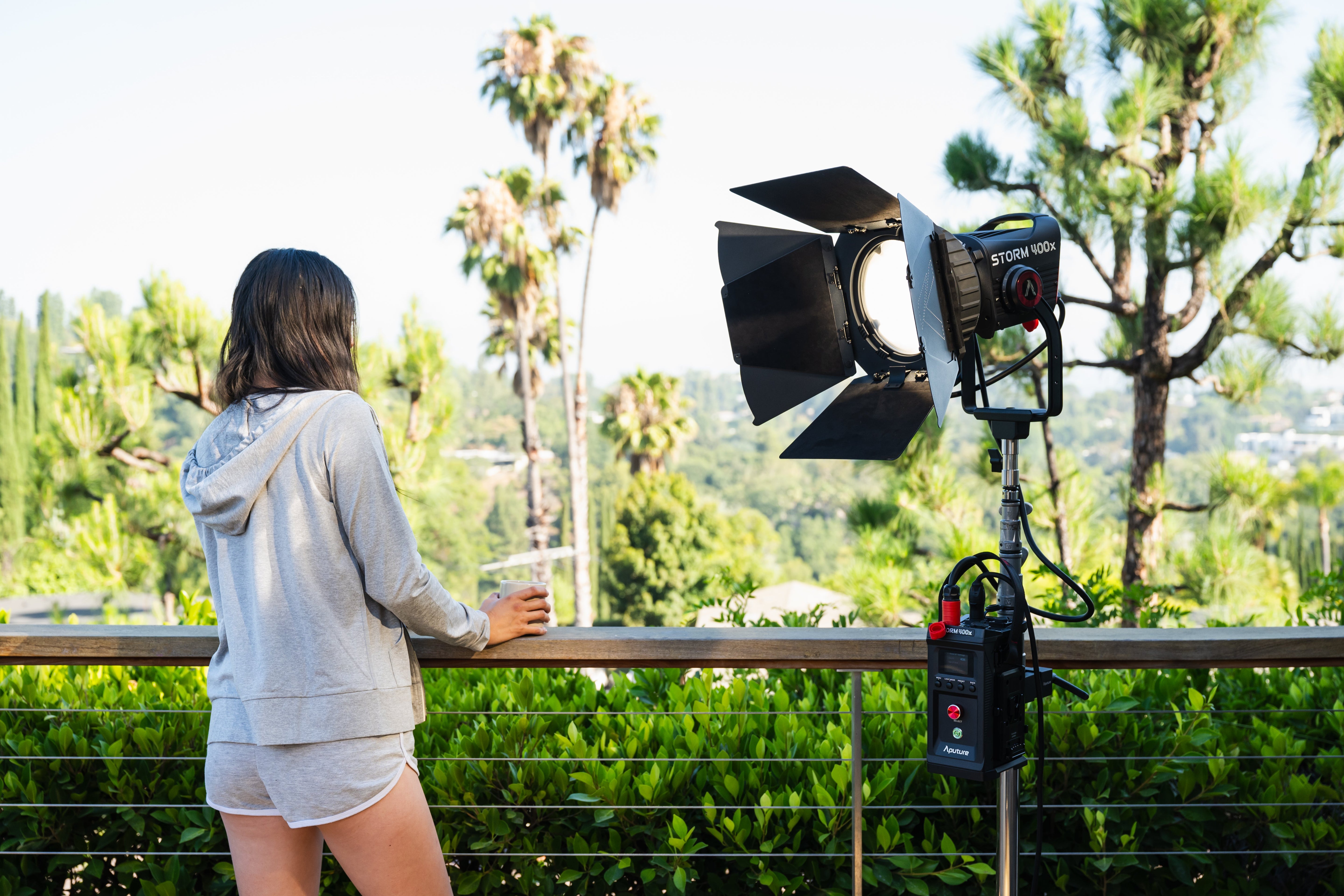 Aputure CF7 Fresnel and Barn Doors Kit being utilised on a photoshoot in an outdoor location.