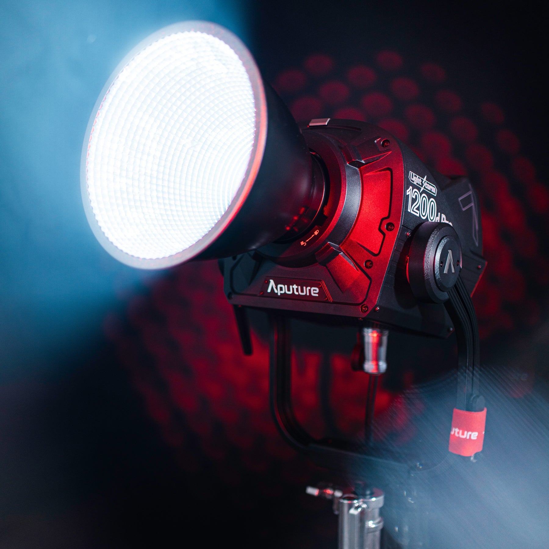 Aputure LS 1200D fixture with Medium Reflector, in red scene.