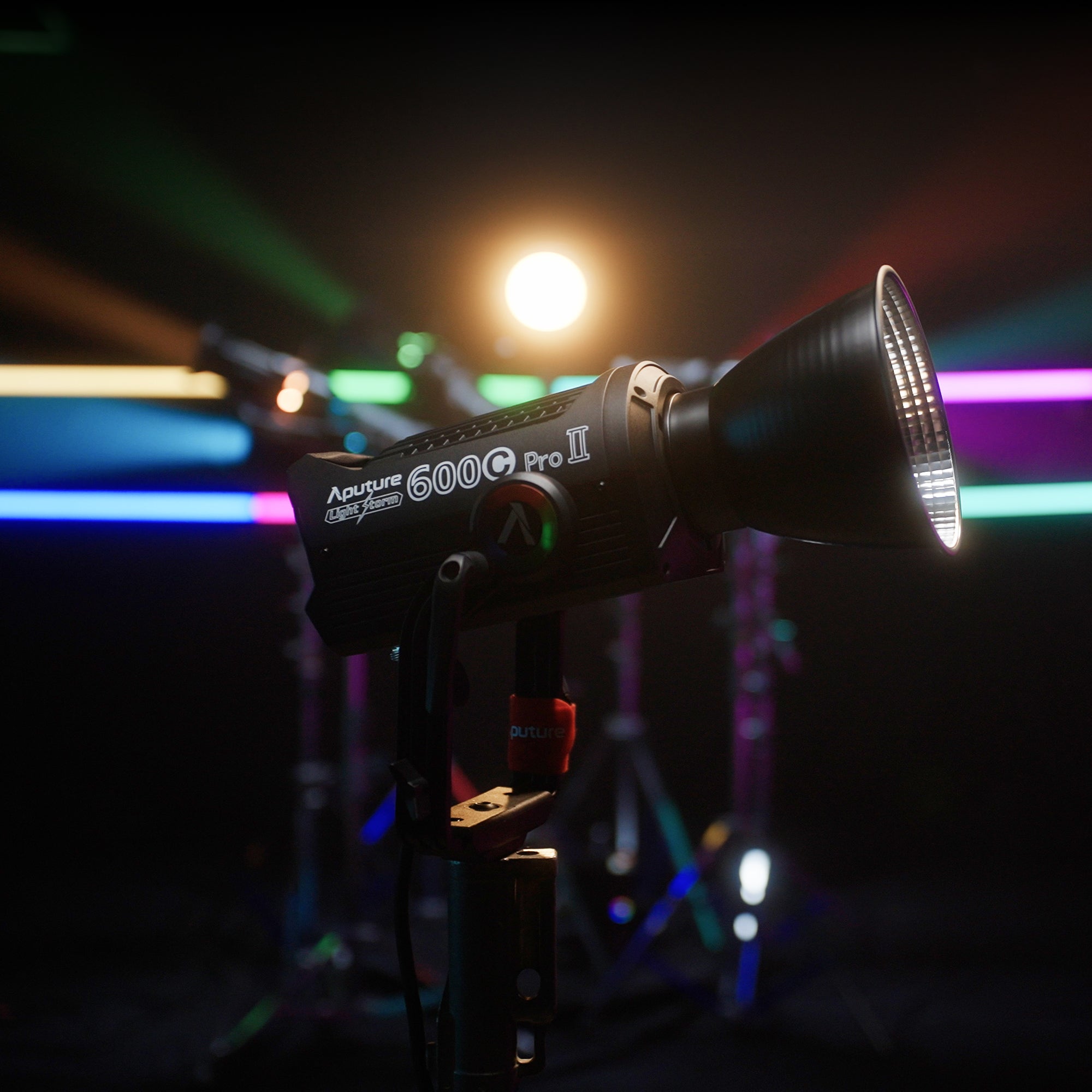 Aputure Light Storm 600c Pro II captured against a scene of other Aputure Full-coloured lights.