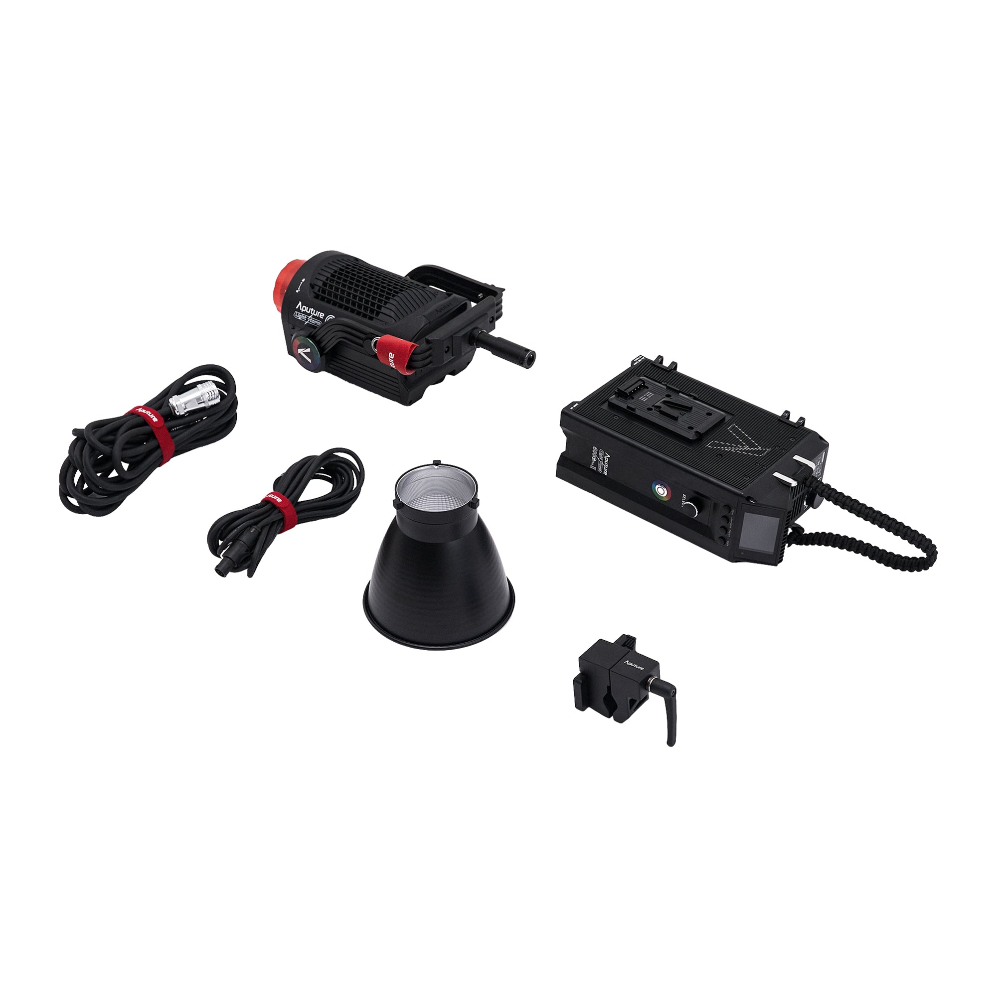 Flat-lay image showing all items except the wheeled carry case. This image shows the LS 600c Pro II CoB Head, the Power Ballast, The Standard Reflector, the stand clamp, head to ballast cable and the UK mains cable.