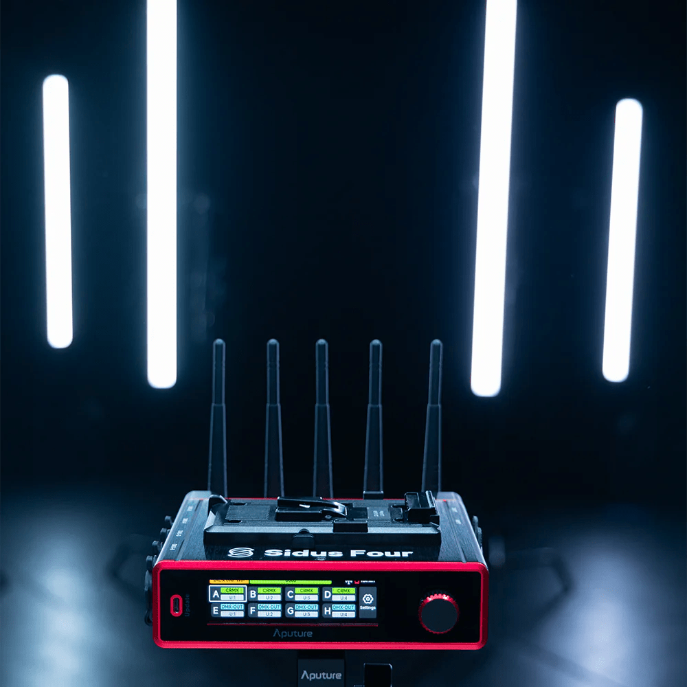 Aputure Sidus Four Hero image with antenna and the screen illuminated.