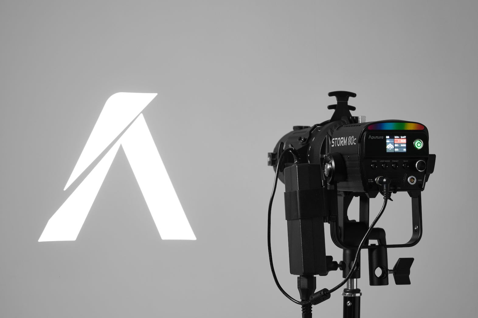 Rear view of the Aputure Spotlight Mini Kit with 19° Lens with screen and button controls visible on the Storm 80c.