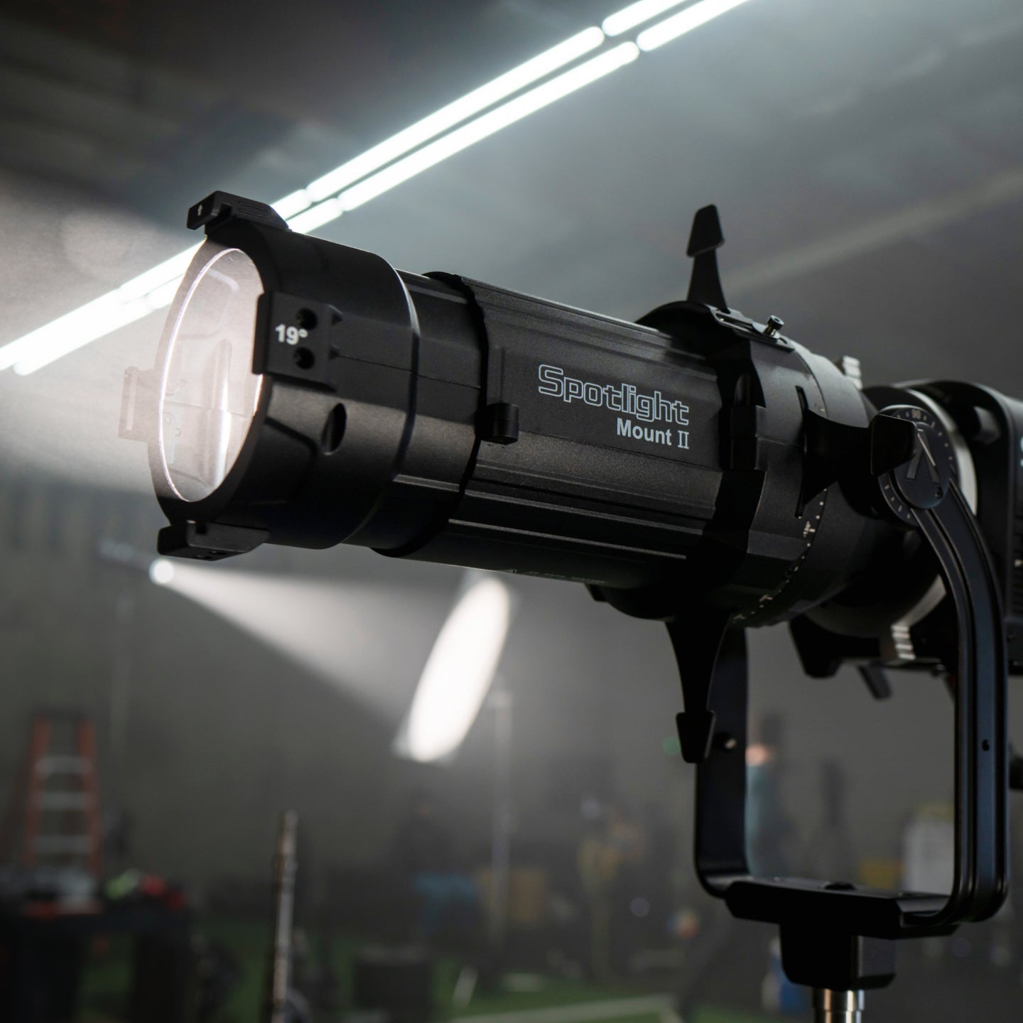 Aputure Spotlight Mount II 19° Lens shown in a studio environment.