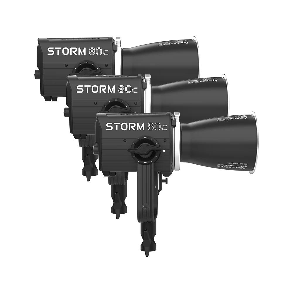 Three black Aputure 'STORM 80c' studio lights on a white background. All part of the Aputure 80 Three light kit.