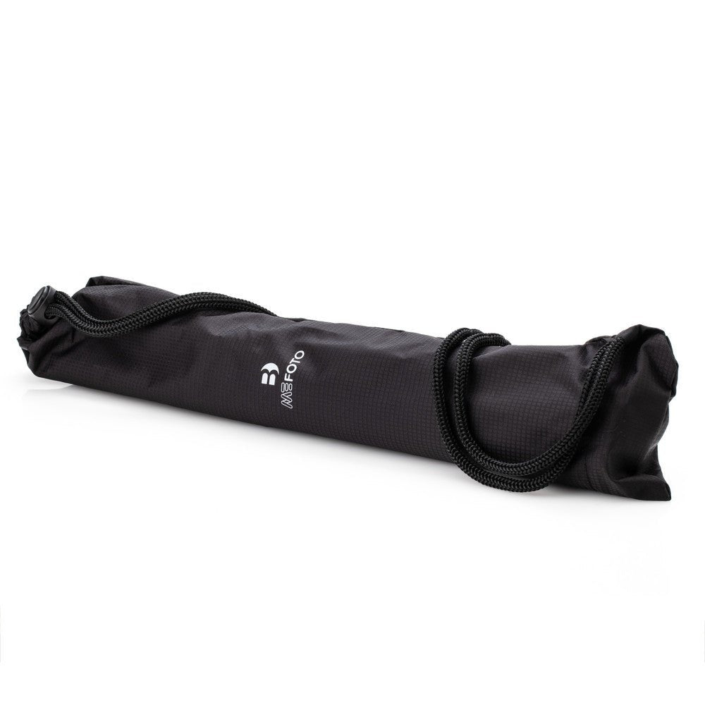 Compact ightweight carbon travel lighting stand shown in its supplied carry bag.
