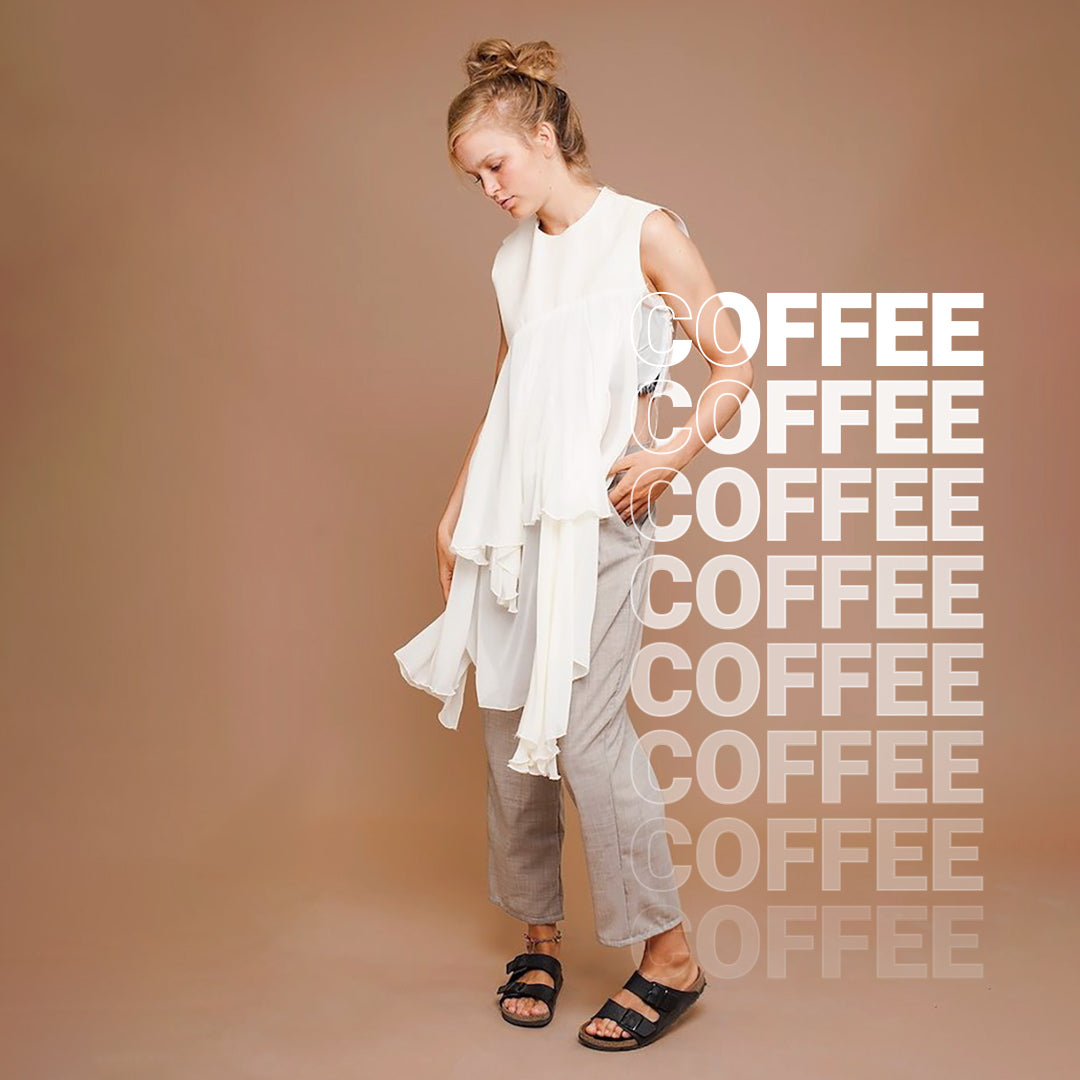 Female subject on a coffee coloured seamless paper background. With the words Coffee in the foreground.