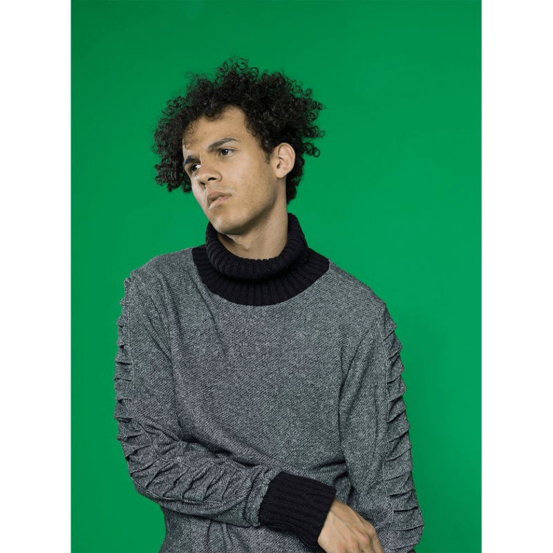 Portrait of a male model pictured with a Chromagreen Seamless Background.