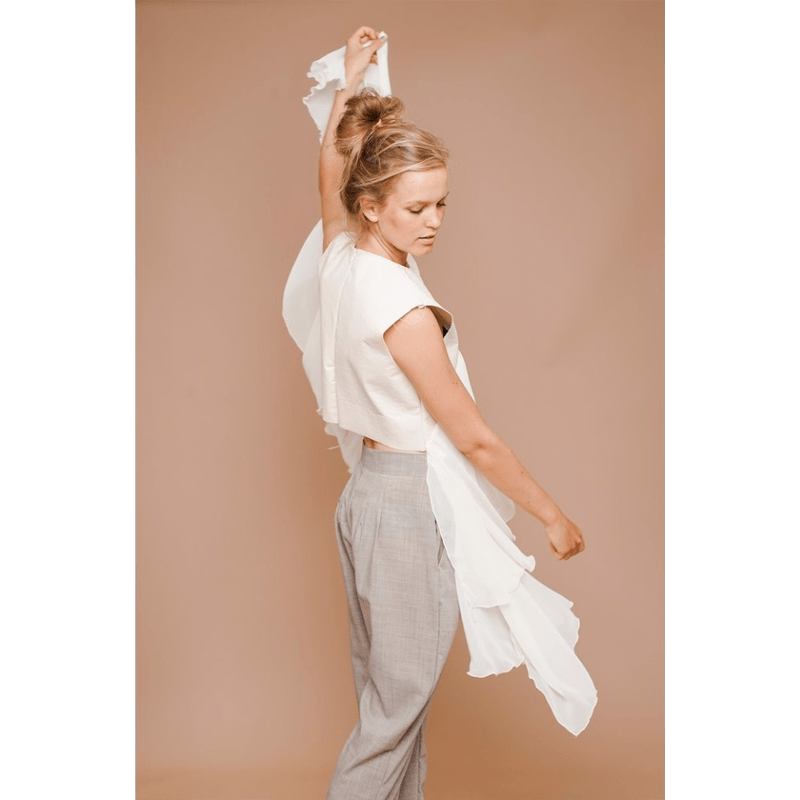 Portrait photograph of a female model withthe Colorama Coffee Background Paper.