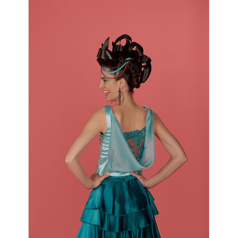 Portrait of a Female Model utilising the Coral Pink Seamless Studio Background Paper.