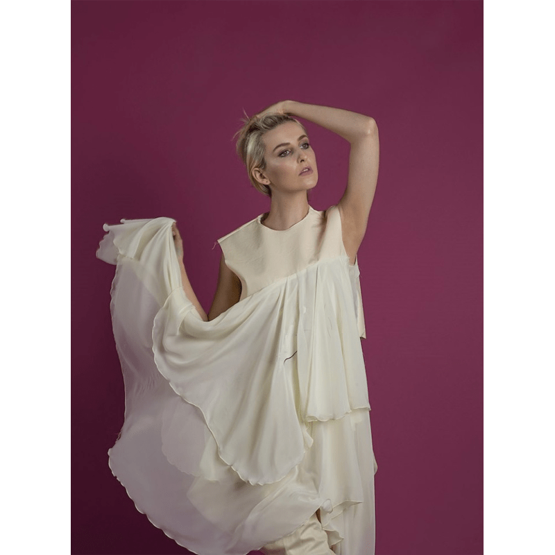 Portrait of a female model utilising the Colorama Damson Seamless Studio Background Paper.