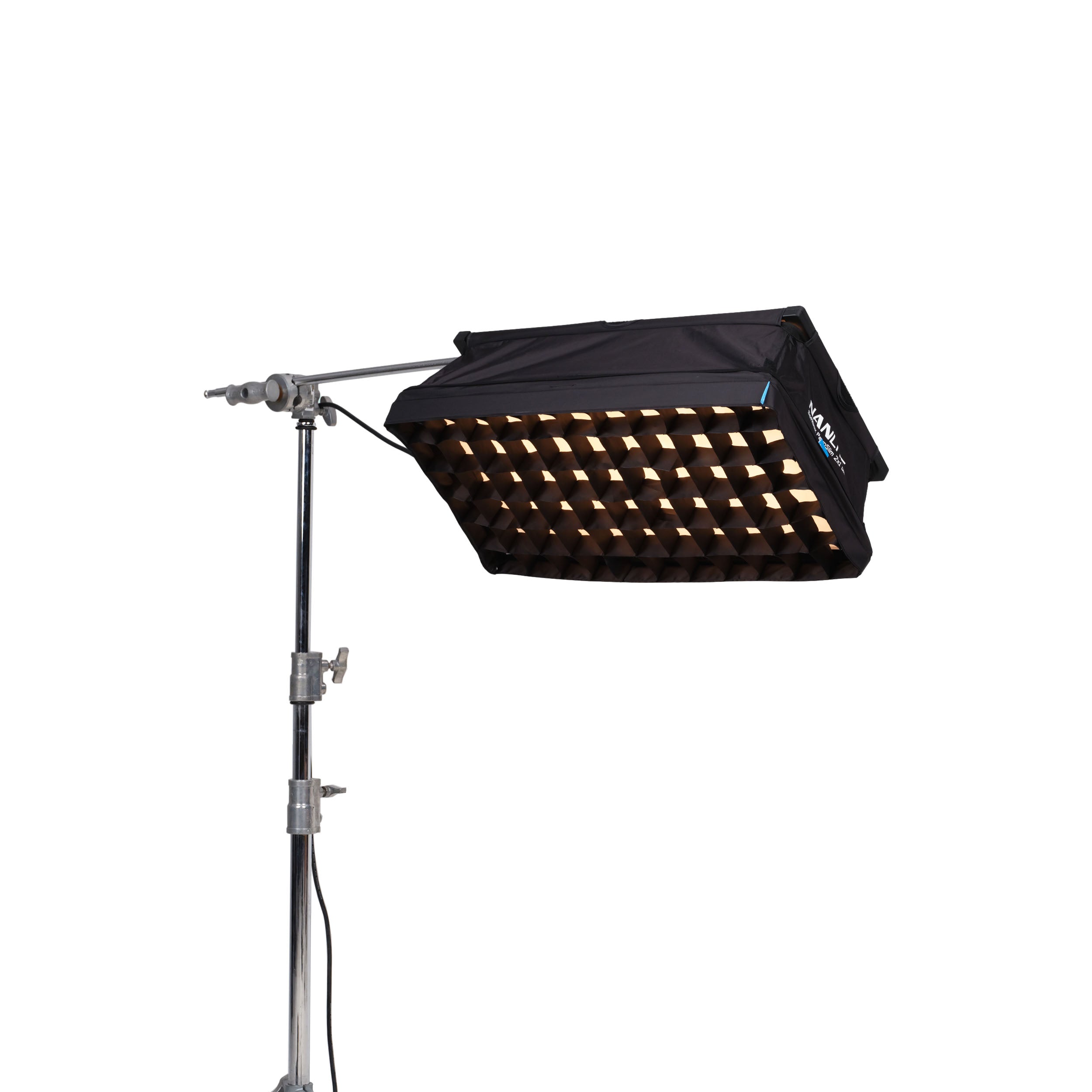 NANLITE PavoSlim 120C LED RGBWW Panel Light attached to a stand with a light grid.