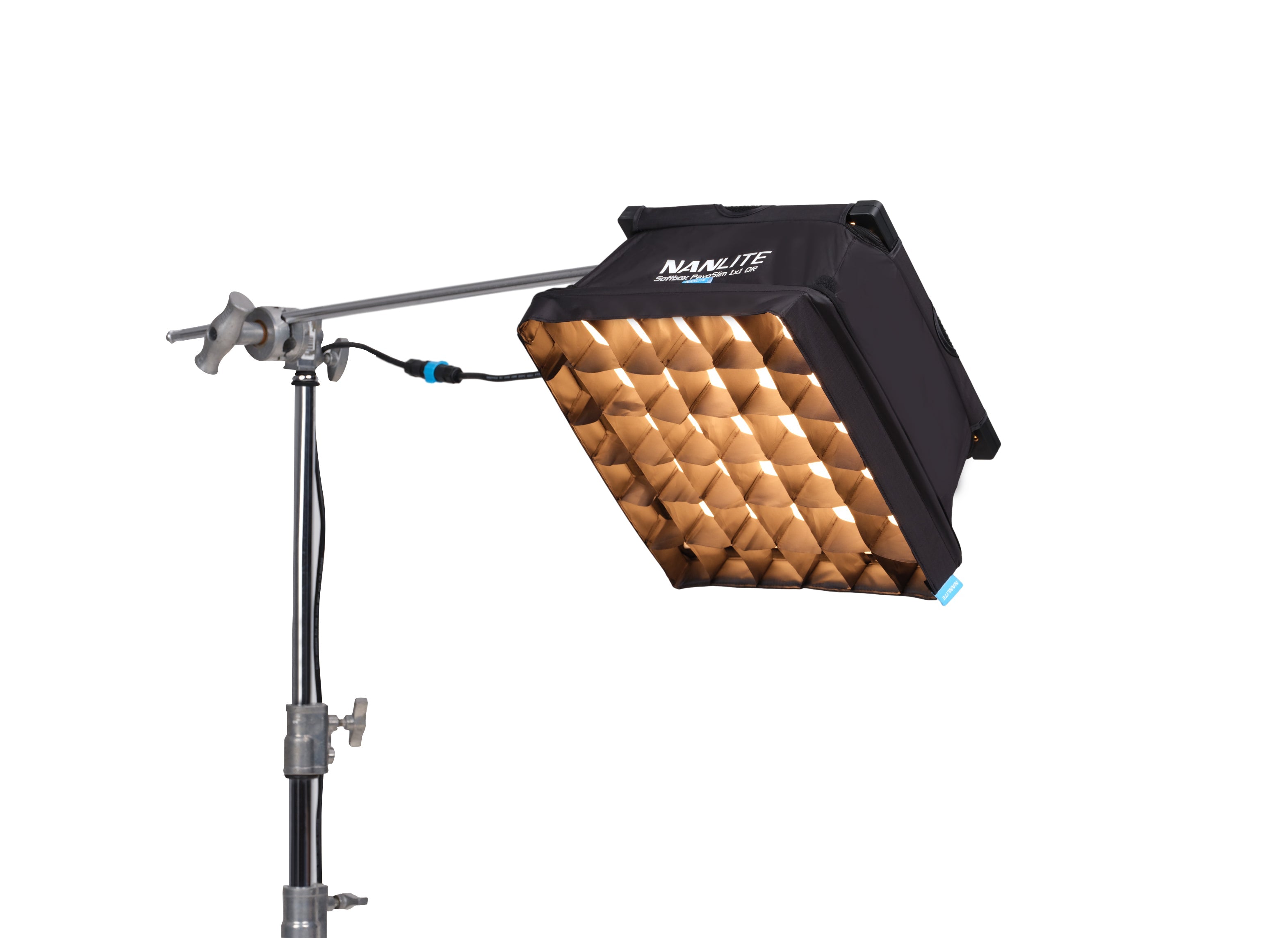 NANLITE PavoSlim 60C LED RGBWW Panel Light with grid and lighting stand connected.