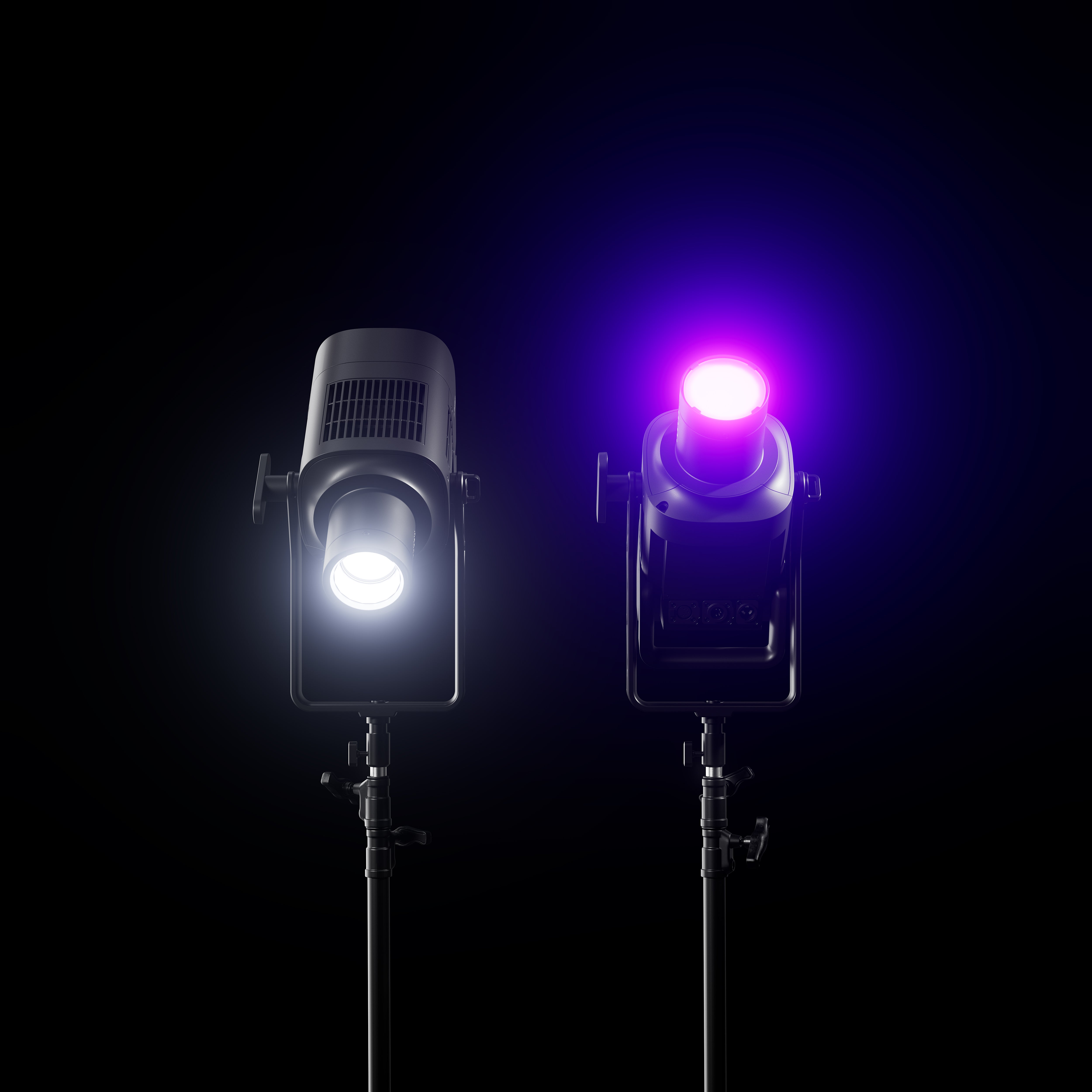 Two Profoto L600C's shown in darkness projecting white and pink light.