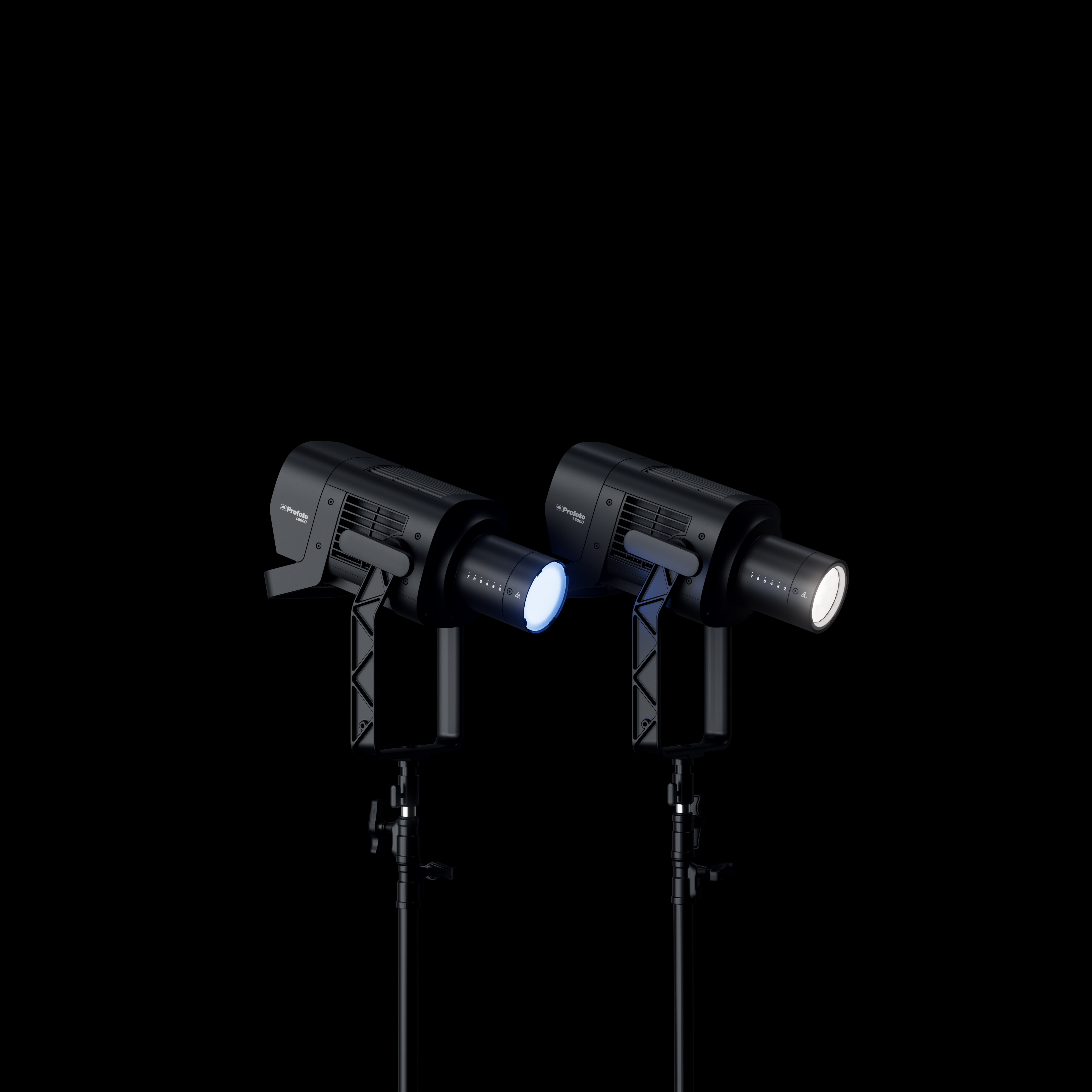 Side view of two Profoto L600C's projecting white light.
