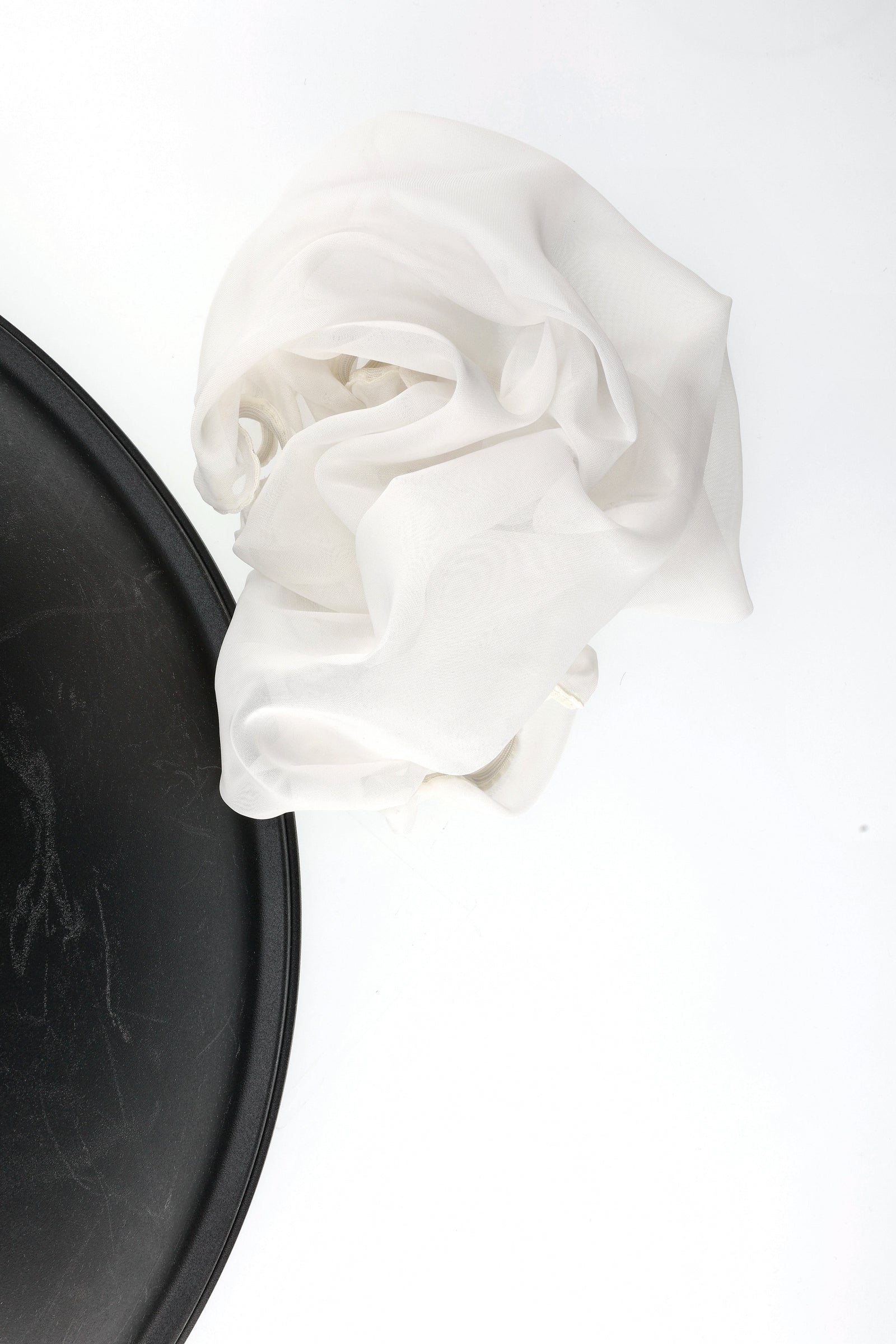 Profoto classic beauty dish with the Profoto Diffuser, softlight White reflector on a white background.