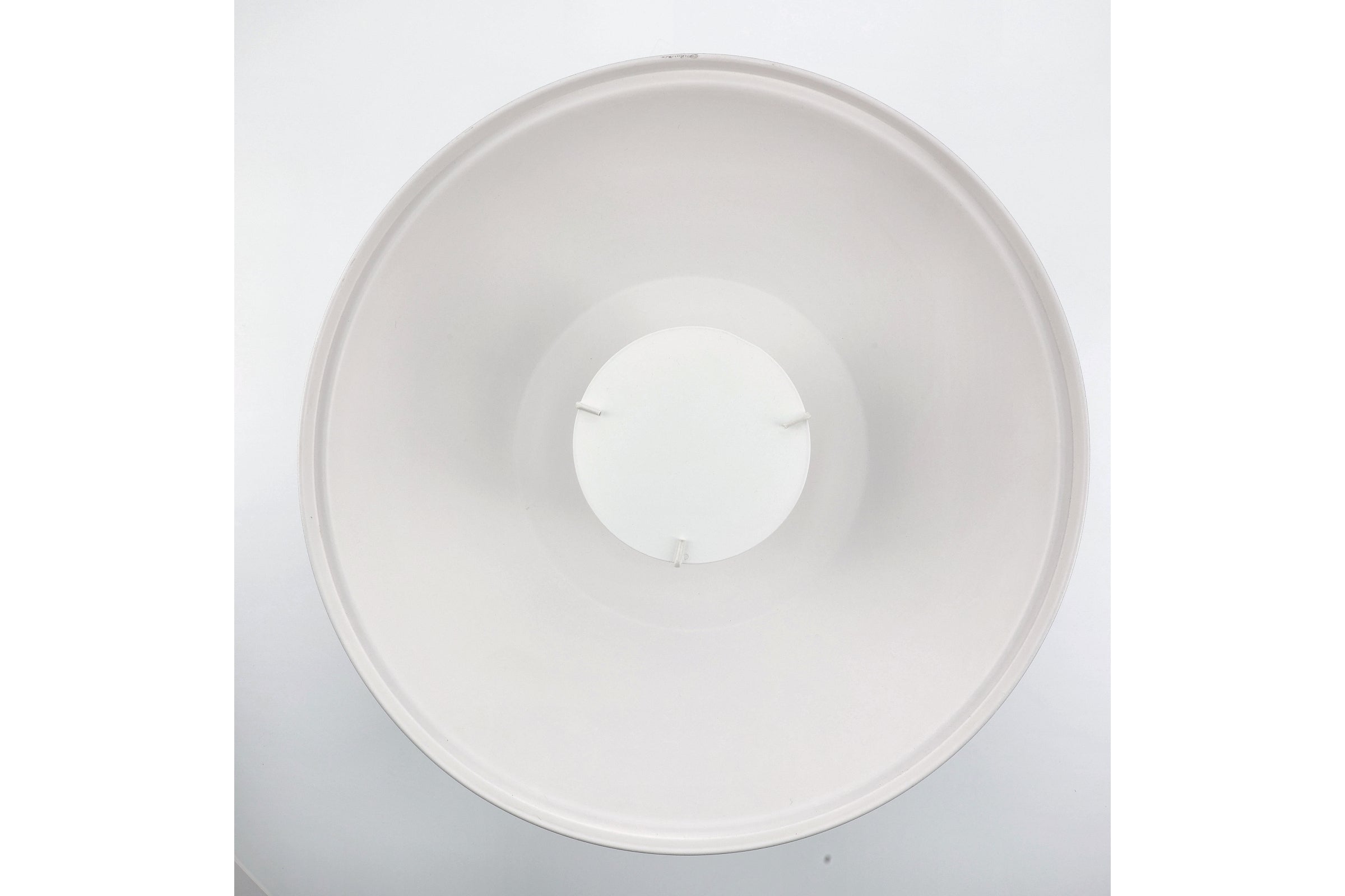 Inside view of a Profoto beauty dish softlight reflector.