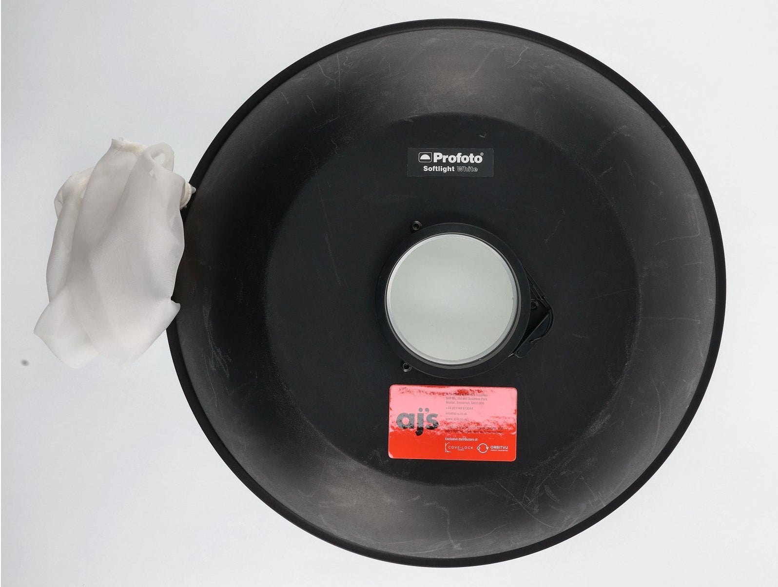 Profoto beauty dish white softlight reflector for beauty or fashion photography on a white background.