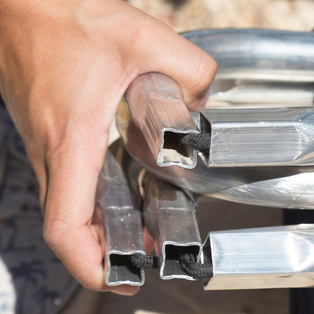 Person holding the collapsed version of the Manfrotto Skylite Rapid Frame Large 2 x 2m.