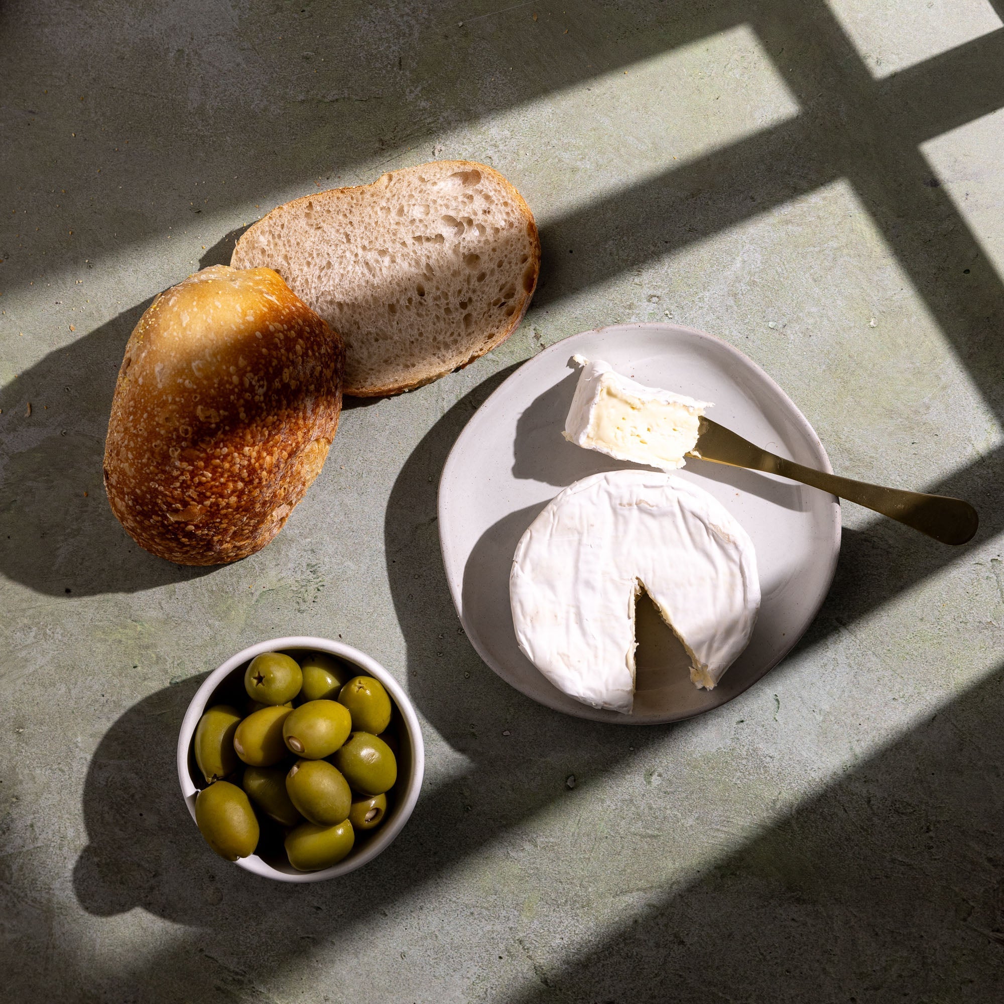 V-Flat Big Window with food being photographed.