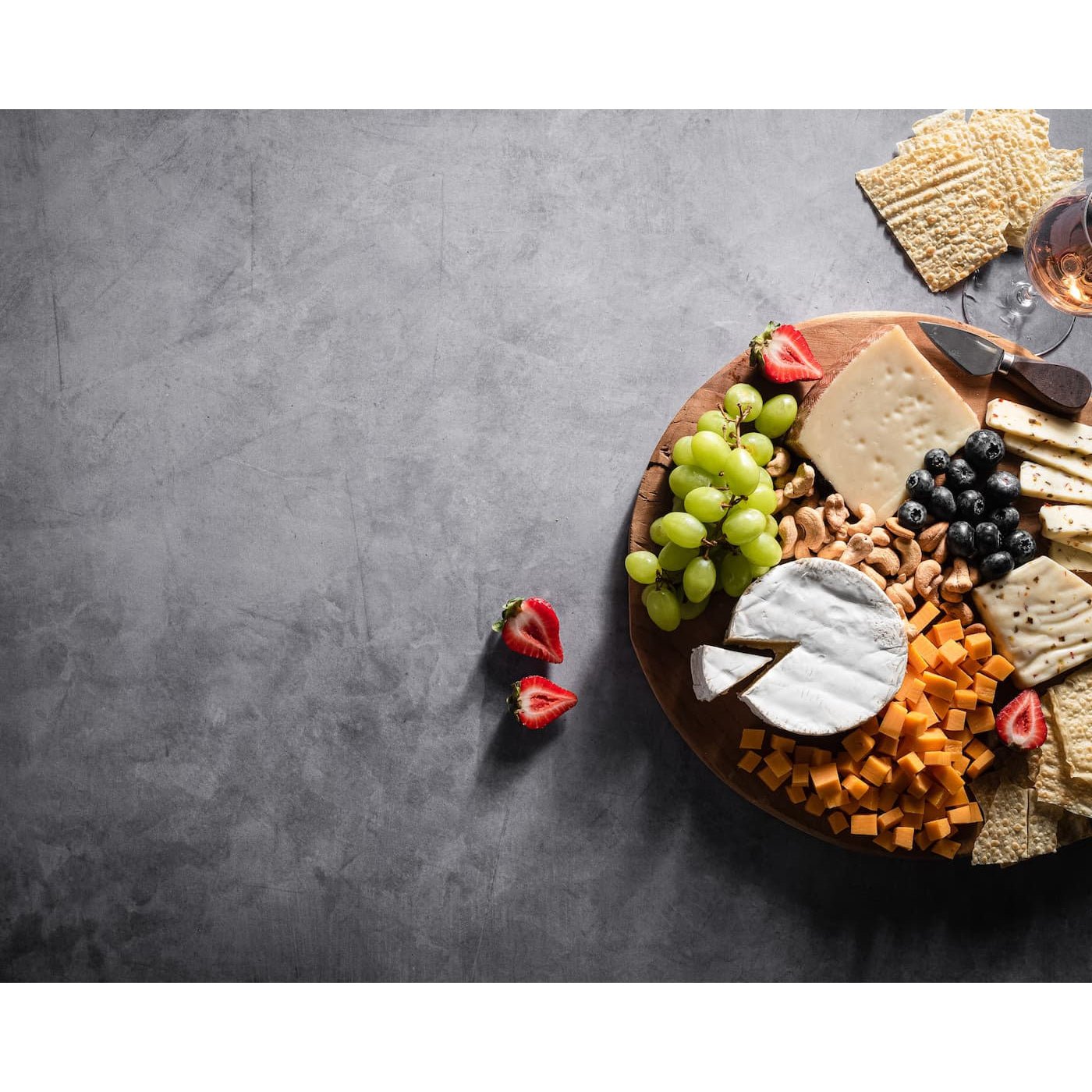 V-Flat Iced Concrete/Midnight Cement - XL Duo Board being used as a background for a cheeseboard photoshoot.
