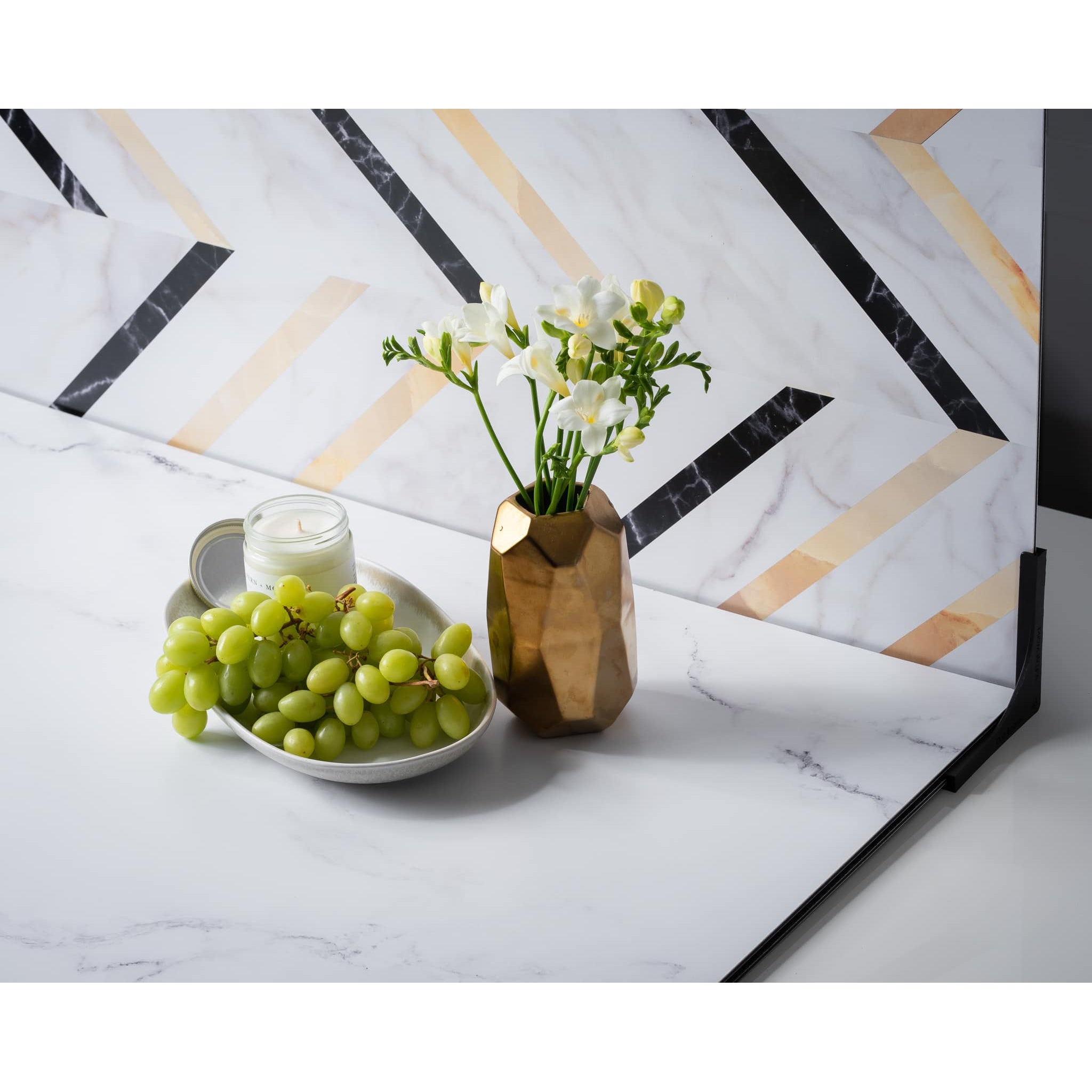 V-Flat Onyx Marble/Alpine Marble - XL Duo Board illustrating some grapes, a candle and some flowers.