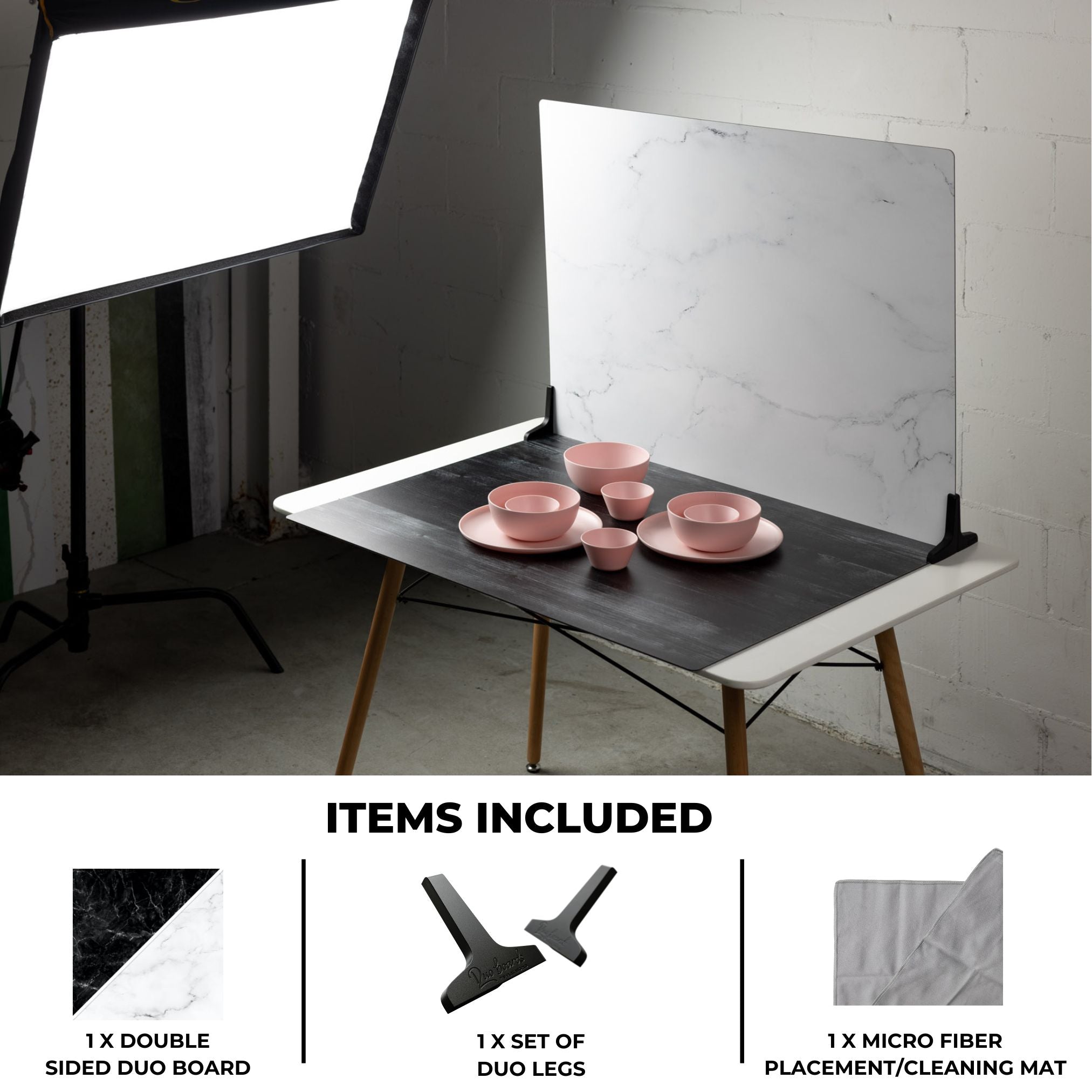 V-Flat Onyx Marble/Alpine Marble - XL Duo Board being used during a photoshoot of kitchen products.