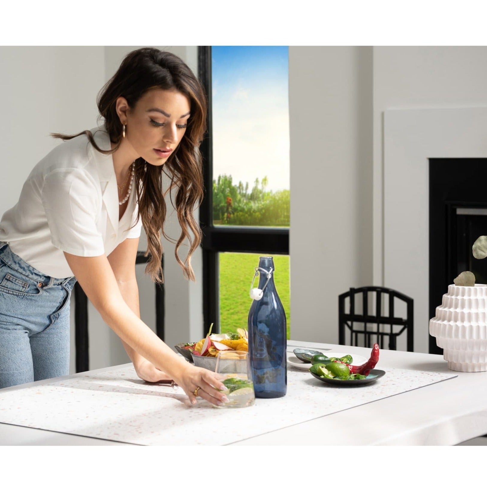 A woman utilising the V-Flat Terrazzo A/B - XL Duo Board.