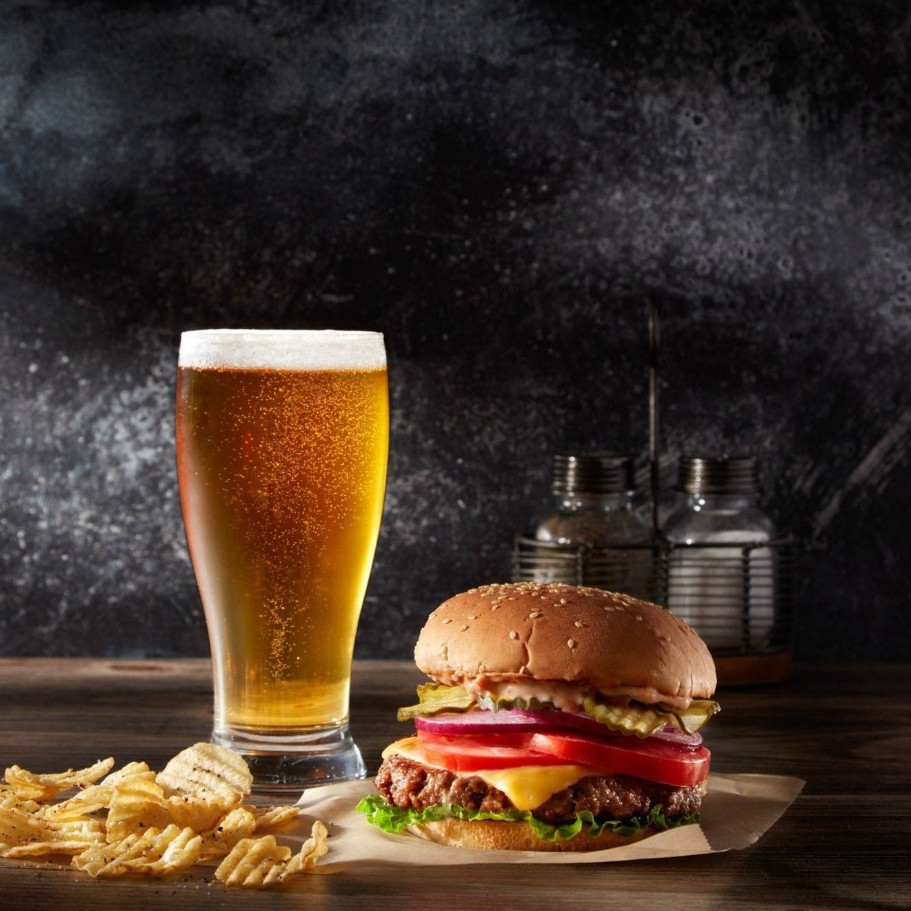 V-Flat Vintage Oak/Ink Hardwood - XL Duo Board shown with a burger and pint of lager.