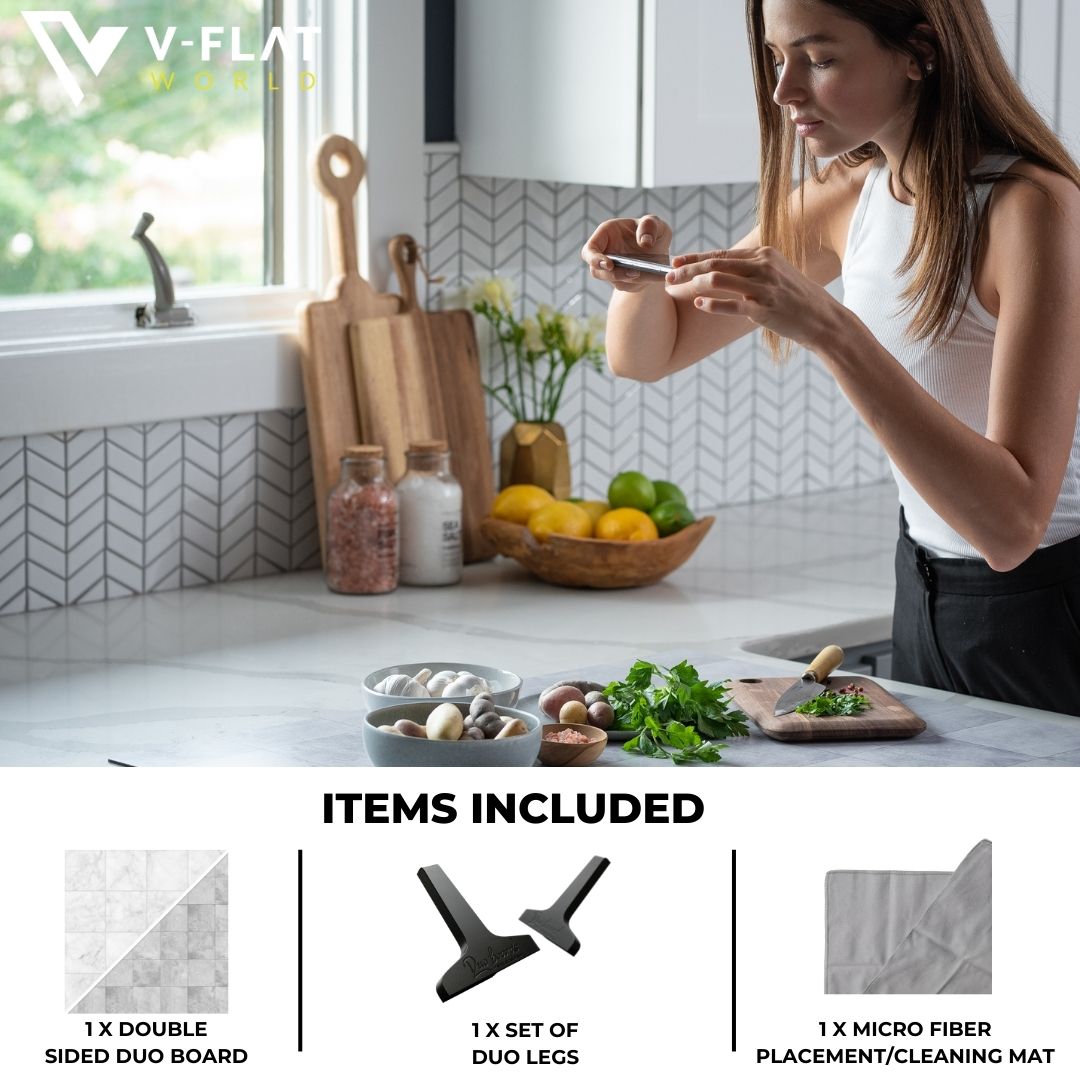 V-Flat Wisp / Pebble Duo Board being used with a lady photographing some items on a kitchen tabletop.