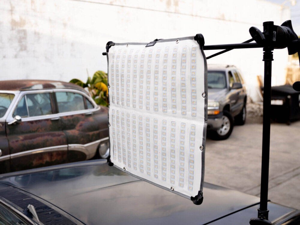 Amaran F22x LED Panel on location attached to a light stand.