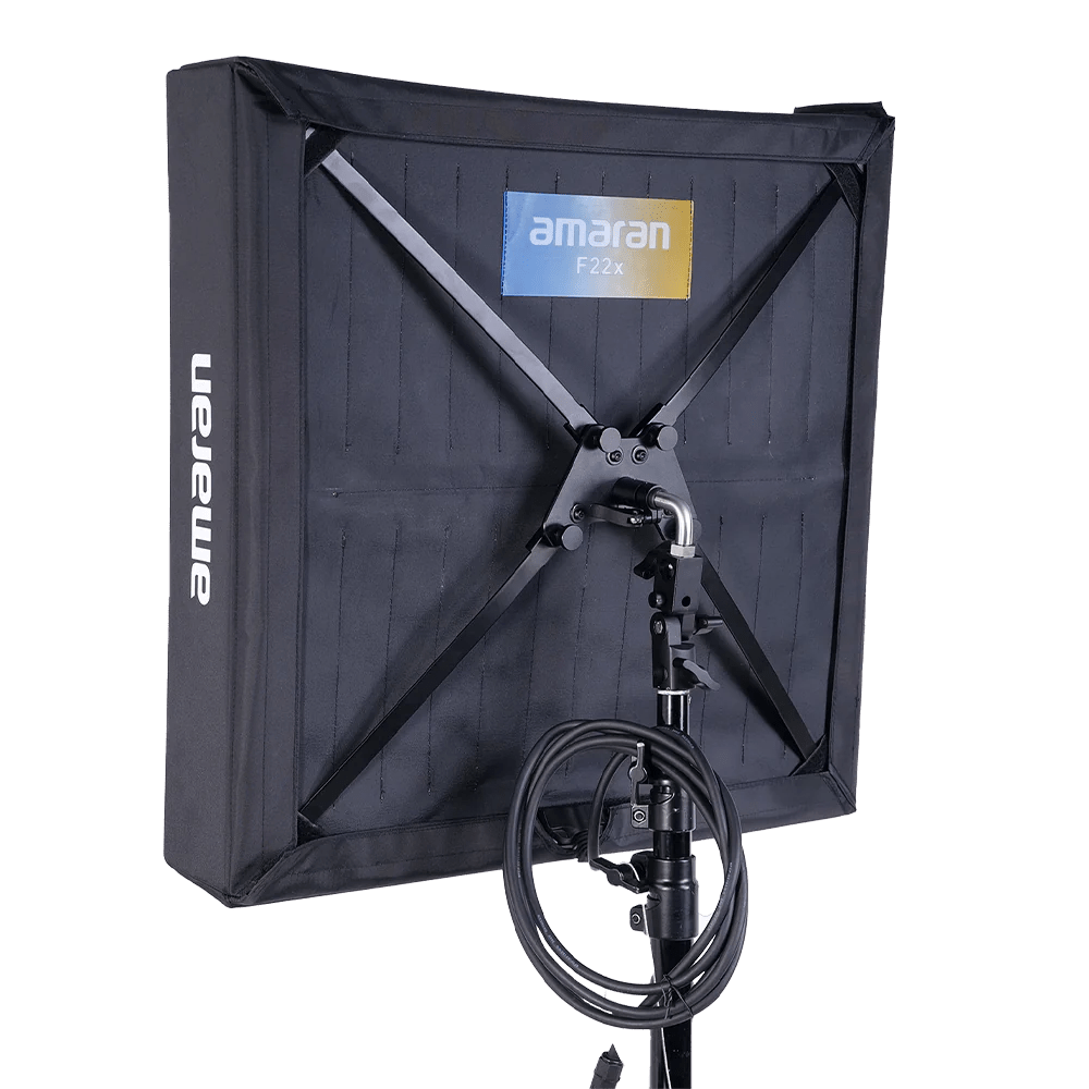 Rear view of Amaran F22x LED Panel light on a stand with connecting cable.