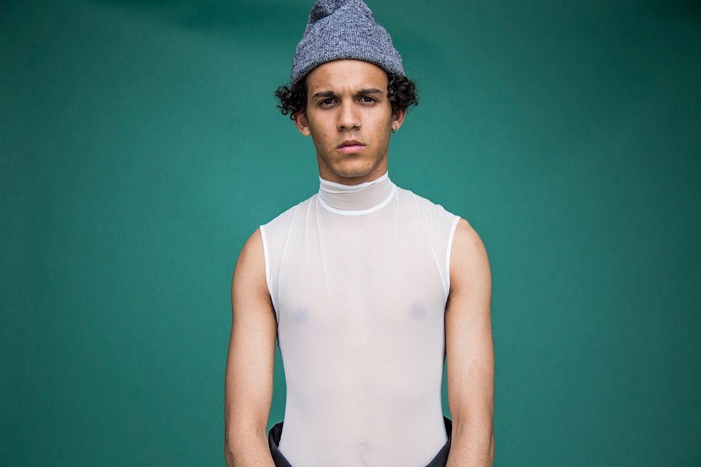 Image of a male model utilising the Colorama Seamless Studio Background Paper.