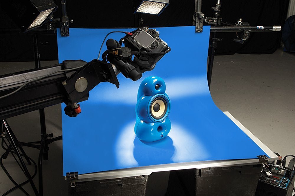 Blue Colorama Colormatt being utilised on a tabletop.