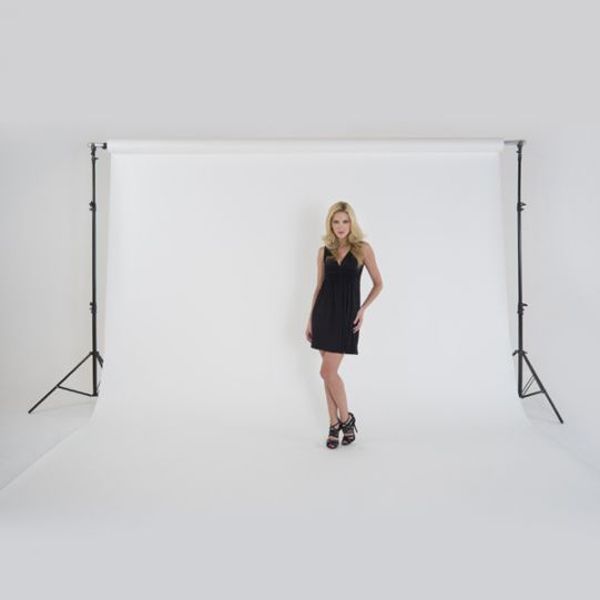 Colorama Solo Background Support 4m (13ft) Heavy Duty being utilised with a Female Model during a Photoshoot.