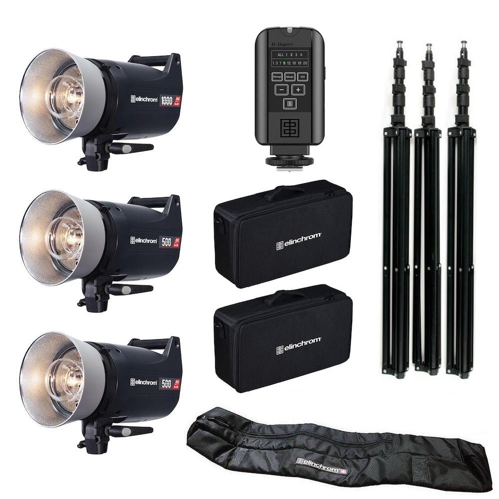 The image shows a set of Elinchrom ELC Pro HD flash units with stands, including three flash heads, lighting stands, a remote control, battery packs, and cases for storage and transportation.