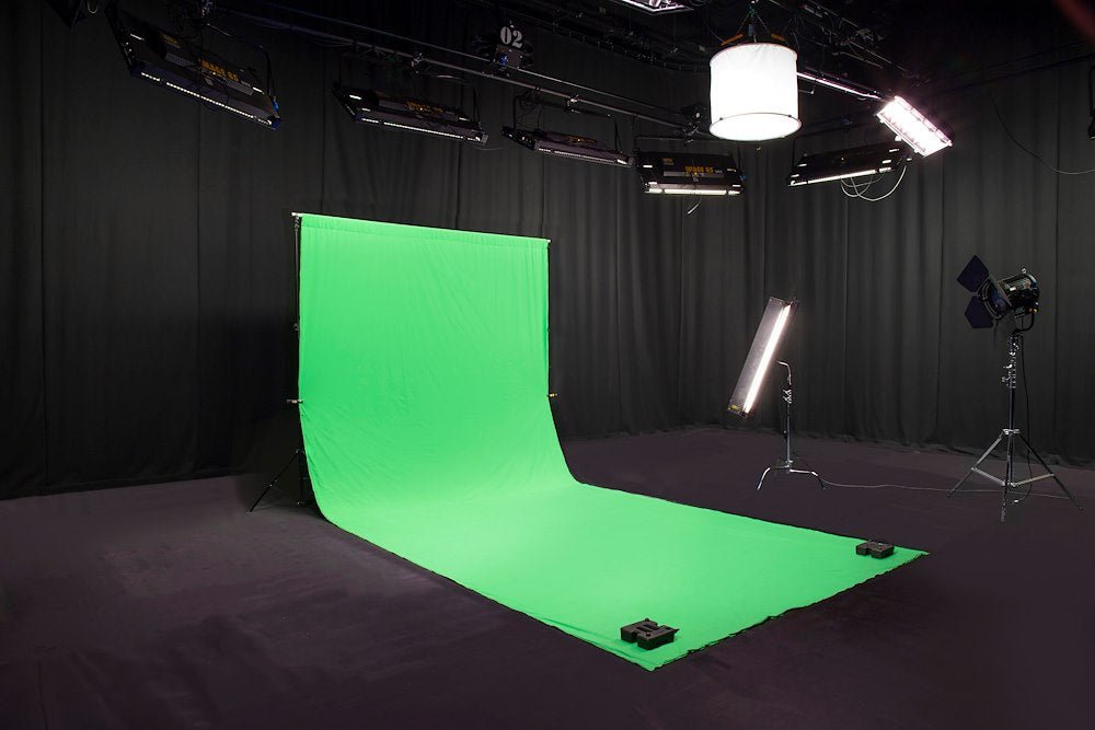 Lastolite Chromakey Green Curtain 3x7m Background in a studio setup with various lighting fixtures.
