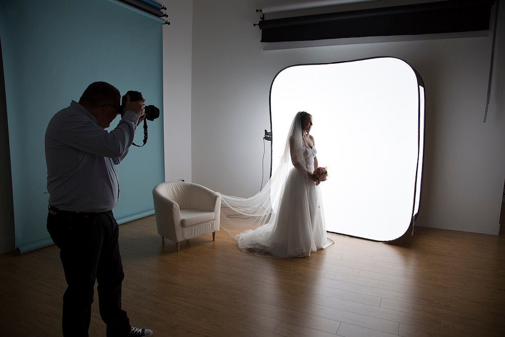 Lastolite Hilite Background in action with a Bride.