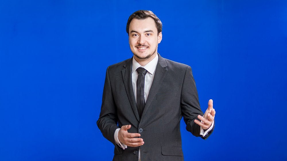 Person (Man) Against Lastolite StudioLink Chroma Key Blue Screen Kit 3 x 3m