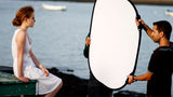 Collapsible Reflector Silver/White L being used on a location shoot