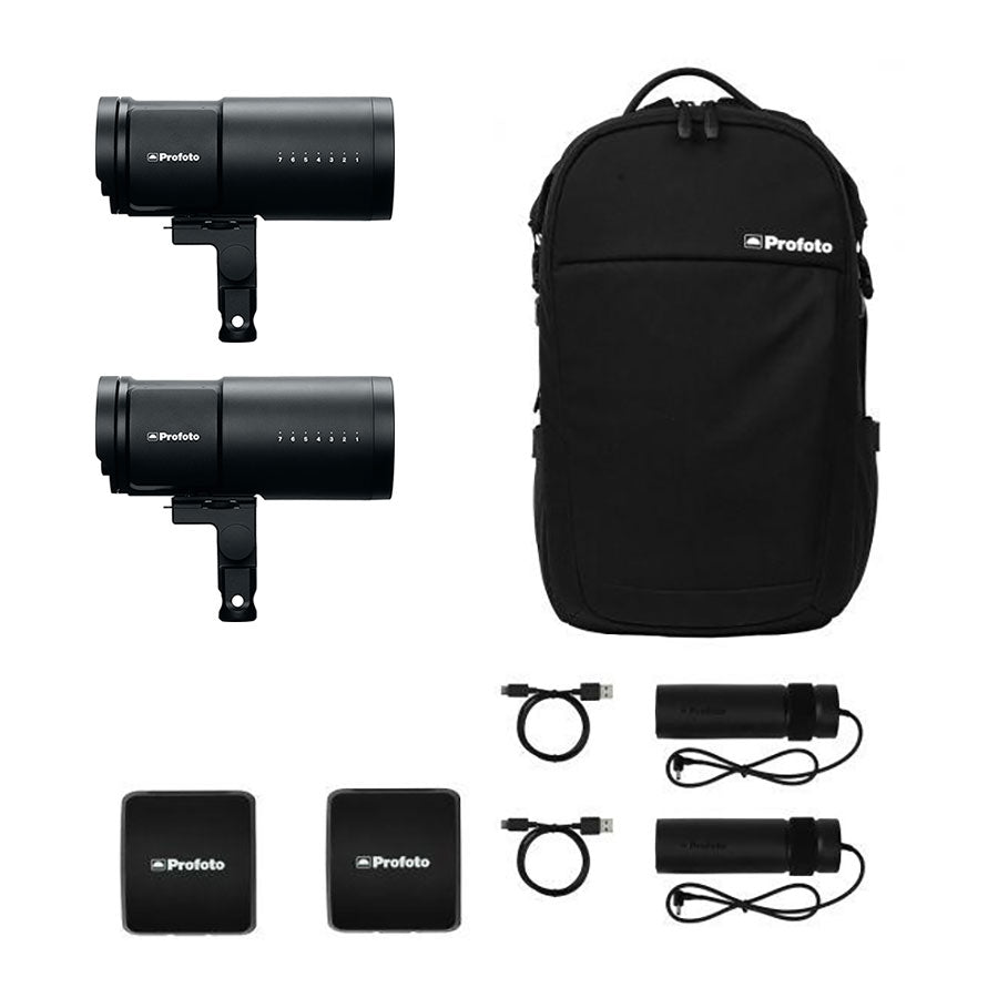 Profoto B10X Plus Duo Kit which includes two portable battery-powered light heads, a backpack for carrying the equipment, multiple cables, and Profoto branded batteries.